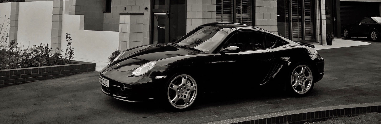 Porsche Cayman S after a single stage machine polish